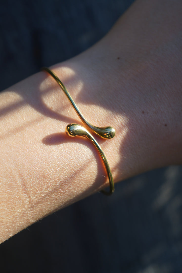 Elsa Peretti for Tiffany & Co. 18k Gold Teardrop Bypass Bangle Bracelet