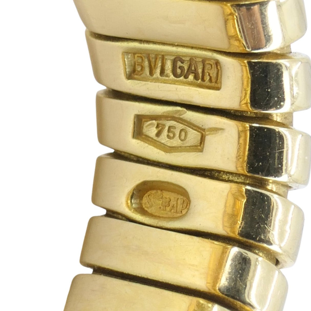 Vintage Bvlgari 18k Gold Tubogas Peridot Ring, circa 1990s