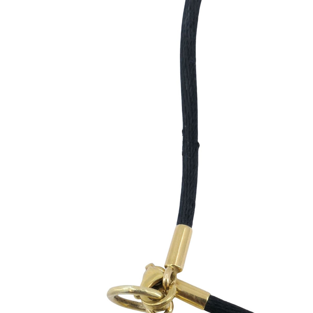 Cartier 18k Gold Arrow Pendant Black Silk Cord Necklace