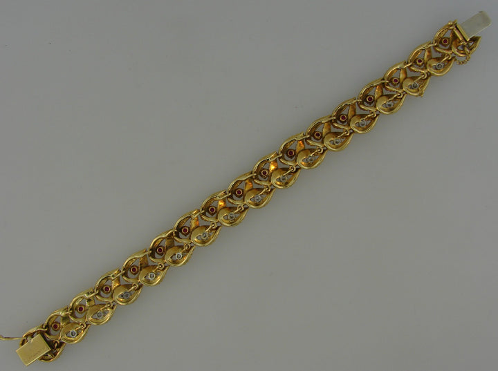 Vintage Boucheron Ruby Diamond Yellow Gold Bracelet Leaf Motif 1950s