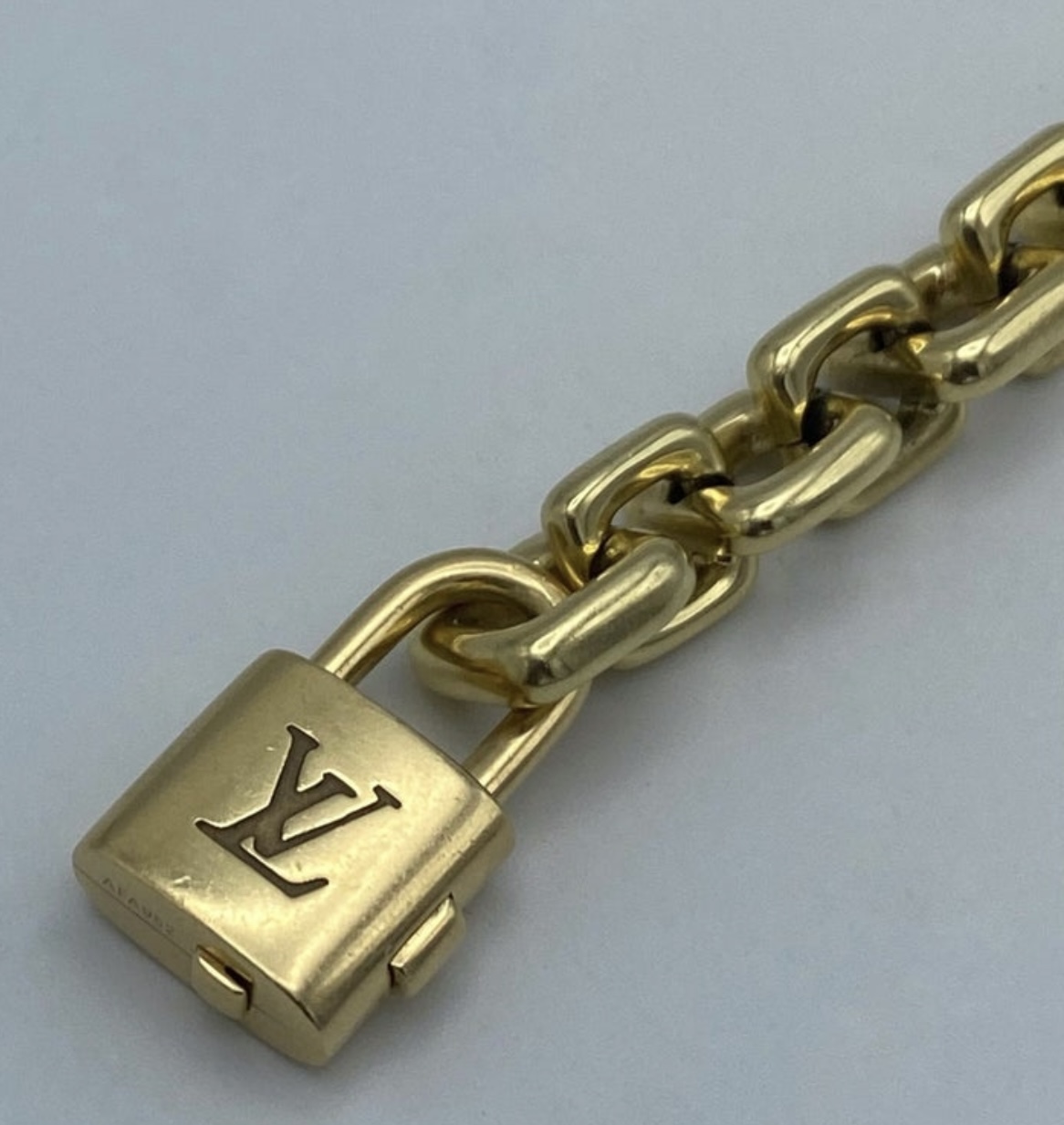 Louis Vuitton Gold Charm Bracelet with Lock and Keys at 1stDibs